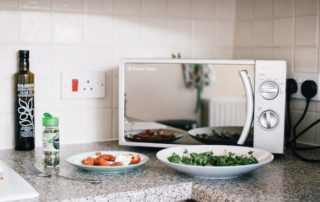 Microwave oven with plates of food
