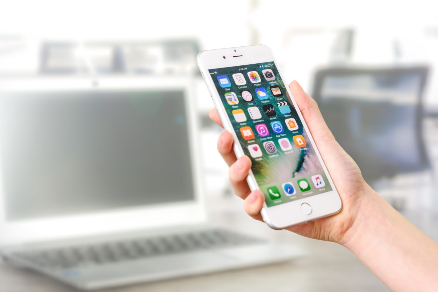 person-holding-silver-iphone-7-887751 battery operated equipment like mobile phones and laptops don't need pat testing but do need checking for safety
