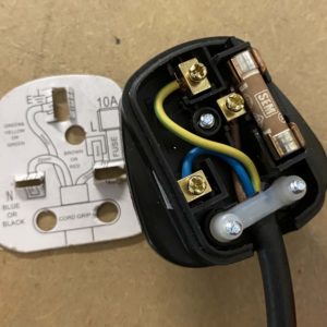 How to wire a plug step 4 showing the wires in the terminals and the cable grip on