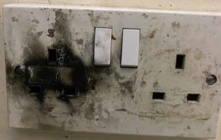 an example of what an overloaded socket can do to a wall socket