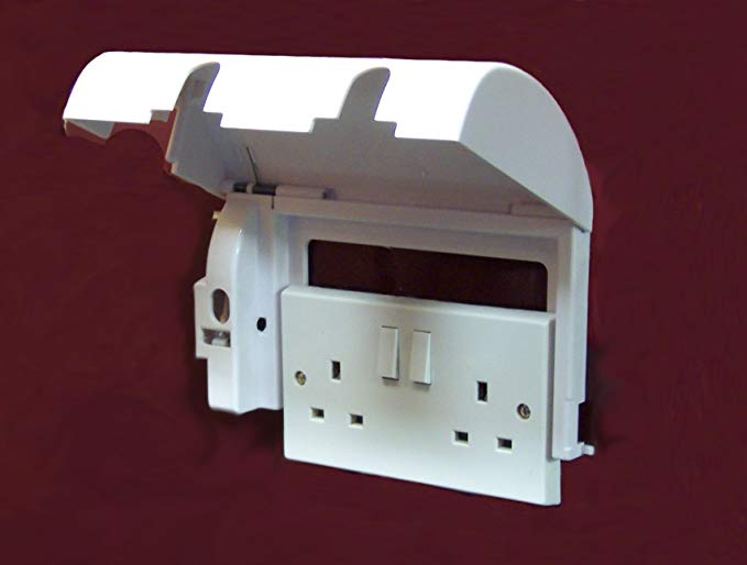 Lockable Socket safety cover being slid into place over a double socket