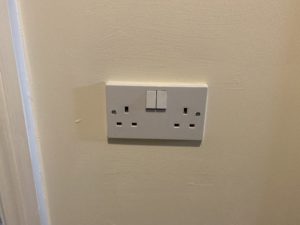 Double UK mains electric socket, switched off