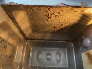Dirty and rusty microwave found in an HMO whilst doing the electrical inspections for the Landlord, in Newcastle upon Tyne