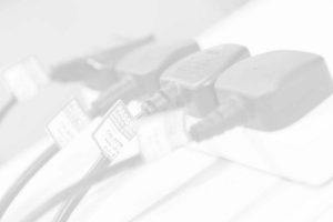 Plugs plugged into an extension lead with PAT testing labels could be overloading the sockets