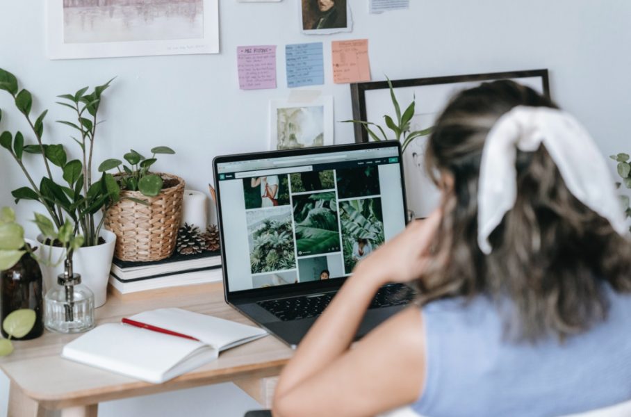 A lady working in her home office using a laptop computer A lady working in her home office using a laptop computer