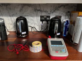 Seaward Apollo 600+ PAT Tester with kettles and PAT testing labels