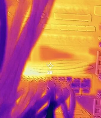 Image of a server rack being examined with a thermal camera Image of a server rack being examined with a thermal camera